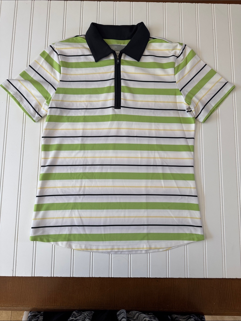 Cutter and Buck woman’s size small Dry Tech shirt.